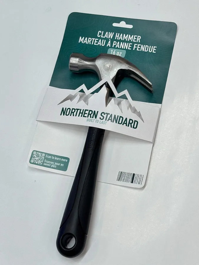 First printed prototype with mountain landscape artwork wrapping a claw hammer